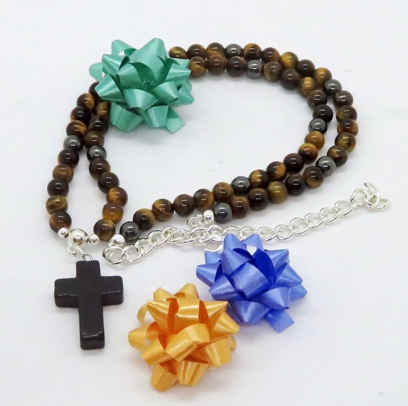 Black Agate Cross with Tiger Eye and Magnetic Hematite Necklace - a unique piece featuring St. Michael, the Archangel. Embrace Christian symbolism with natural stone from RivendellRocksSedona. #ChristianJewelry #GemstoneNecklace buff.ly/3T8ClzO