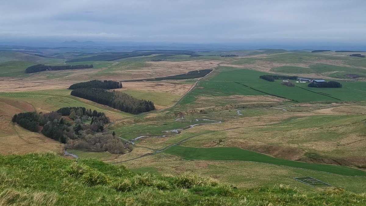 This photo was taken from Woden Law hillfort in the Borders as I began my walk along the Roman road known as Dere Street. You can see the line of the road running across the centre of the image, past the site of Pennymuir Roman camps and into the distance. #HillfortWednesday