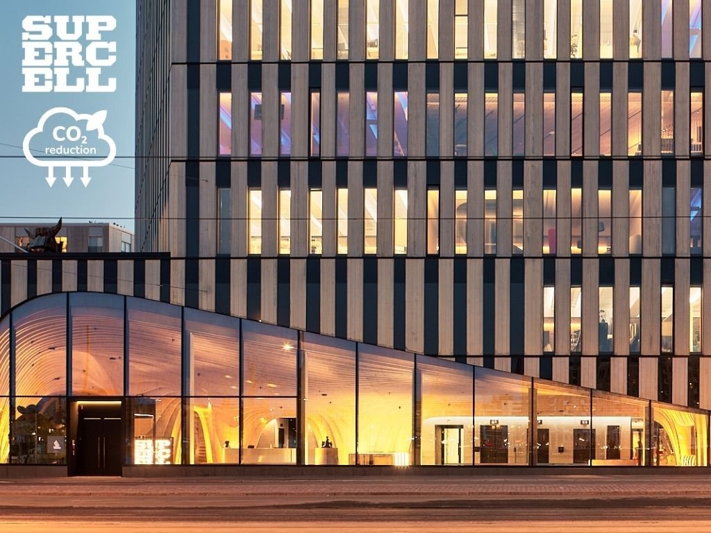 supercell's tweet photo. Wood City: The largest wood office building in Finland as measured by the amount of wood used. That’s a lot of 🪵 wood! #EarthDay2024

This qualifies as an eco-action (action or activity within a program that is intended to have a positive impact on the environment), as this amount of wood absorbs as much CO2 as driving 600 cars for a year.

Wood sequesters carbon and is often considered a more sustainable building material than steel concrete.