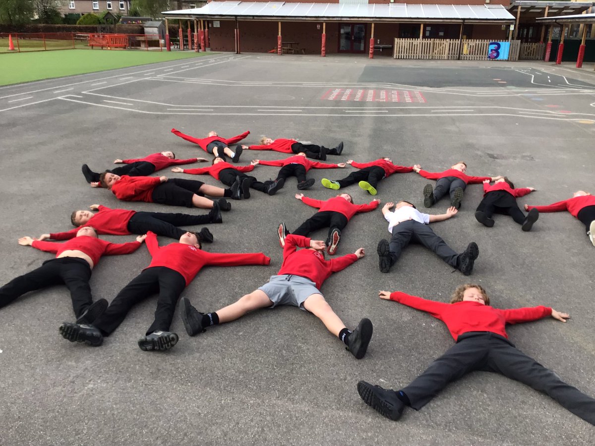 Ms_Middleman's tweet photo. Year 6 practising Area &amp; Perimeter by using our “plus plus perimeter “ chant. And X on the floor for Area. @YsgolEmmanuel #WalesOutdoorLearningWeek #WythnosDysguAwyrAgoredCymru https://t.co/iAuNxJk5vD