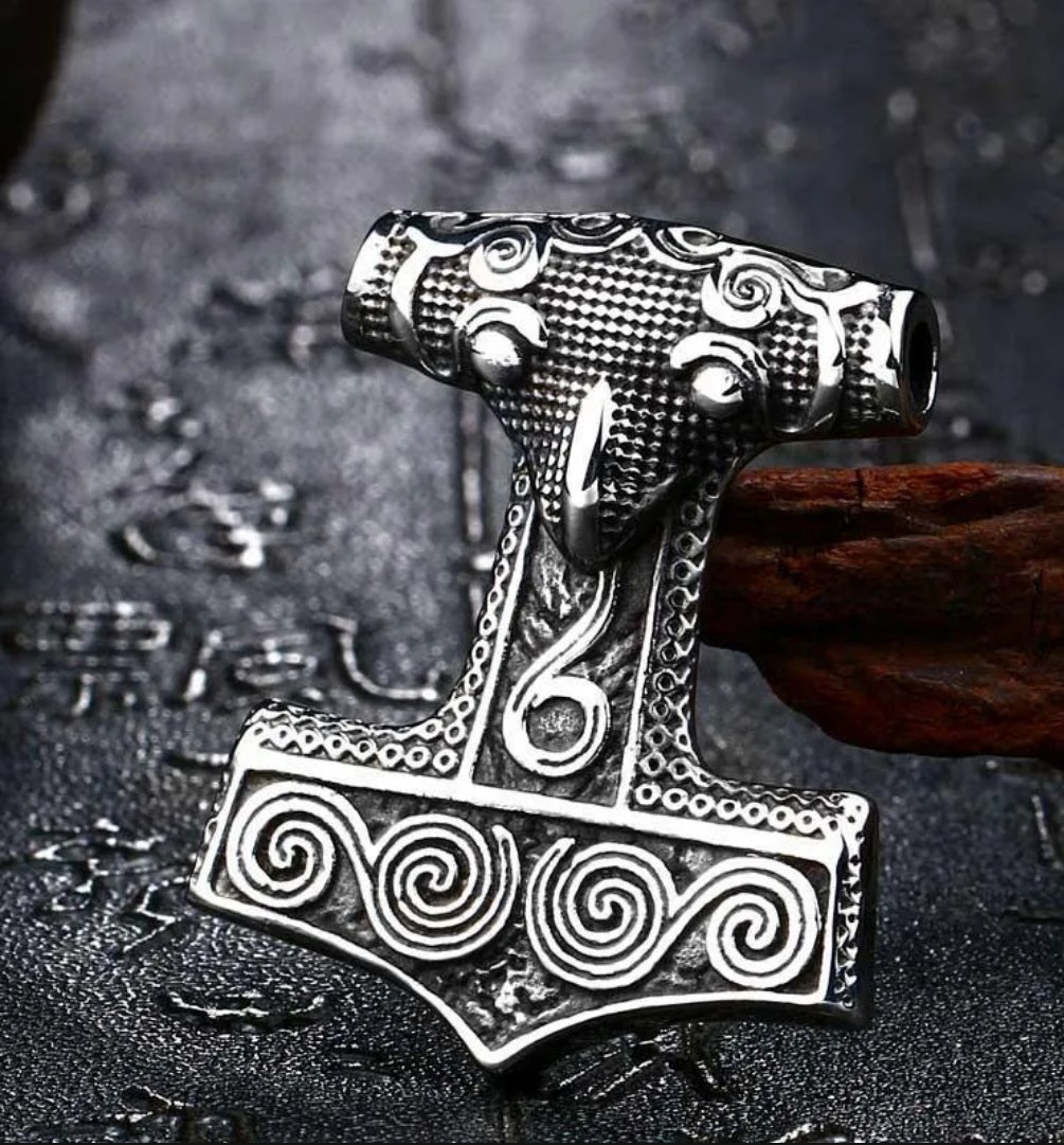 Beautifully adorned 10th century Mjølner (Thor’s hammer) on the left versus a $17.99 replica om the right. The original was inscribed with runes translating to 'This is Hammer', proving that these pendants were in fact possible representations of Thor's hammer 'Mjølner'.