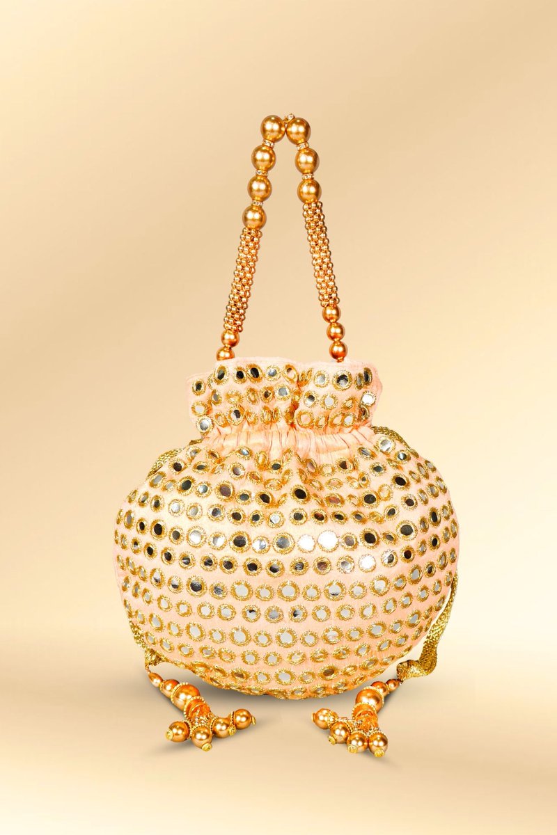 Add a touch of elegance to your outfit with our Peach Mirror Work Potli Bag! Perfect for any occasion. ✨👛 #PeachMirrorPotli #FashionMustHave #AccessorizeInStyle #HandcraftedBeauty

SHOP NOW 👉 sttylme.com/products/peach…
#sttylme