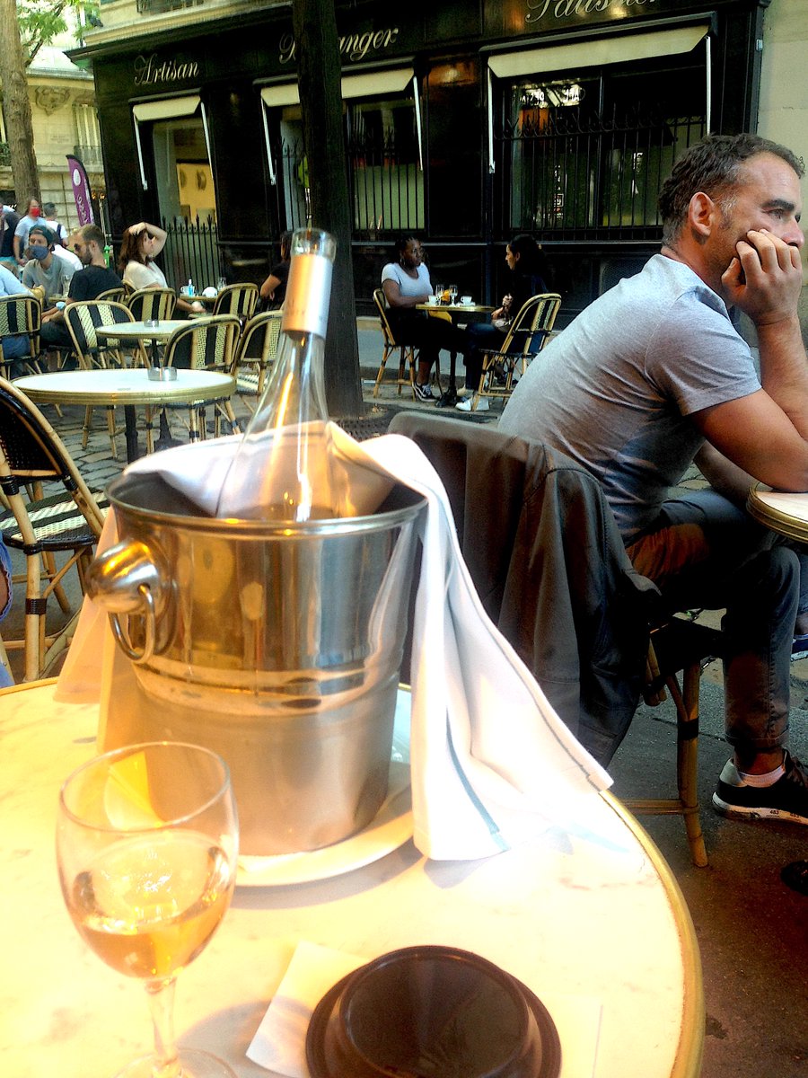 Terrace Tuesday: spring in the air means #rosé #apéros on a café terrace. #montmartre #cafesofparis #springtimeinparis #planchemixte #champagne