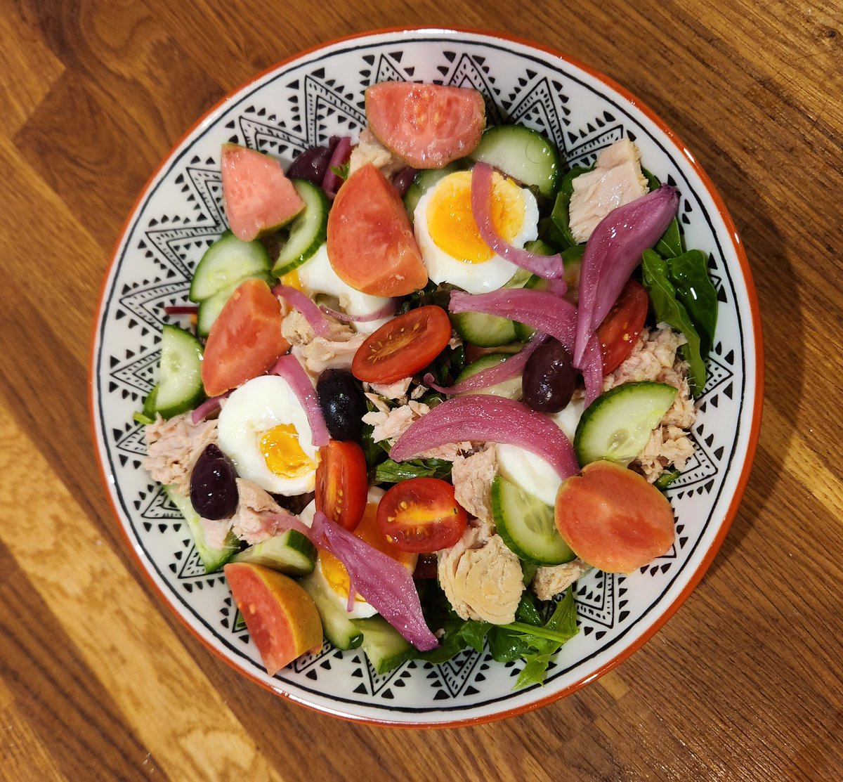 I am calling this my 'home-alone' meal: egg, tuna, mixed salad, tomatoes, cucumber, guava, olives, marinated onion, lime juice, grapeseed oil. Drop by!