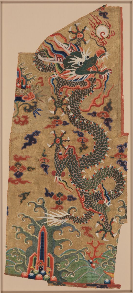 Panel with Dragon China 17th century 'Gold metallic thread is especially prominent in the background, and thread made from peacock feathers wrapped around a silk core is seen in the scales of the dragon' (Met Museum)