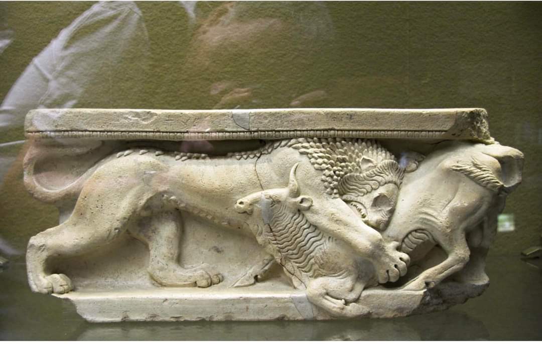 Terracotta altar decorated in high relief. Lion attacking a bull. Centuripe, 525-500 BC. Archaeological Museum of Syracuse.