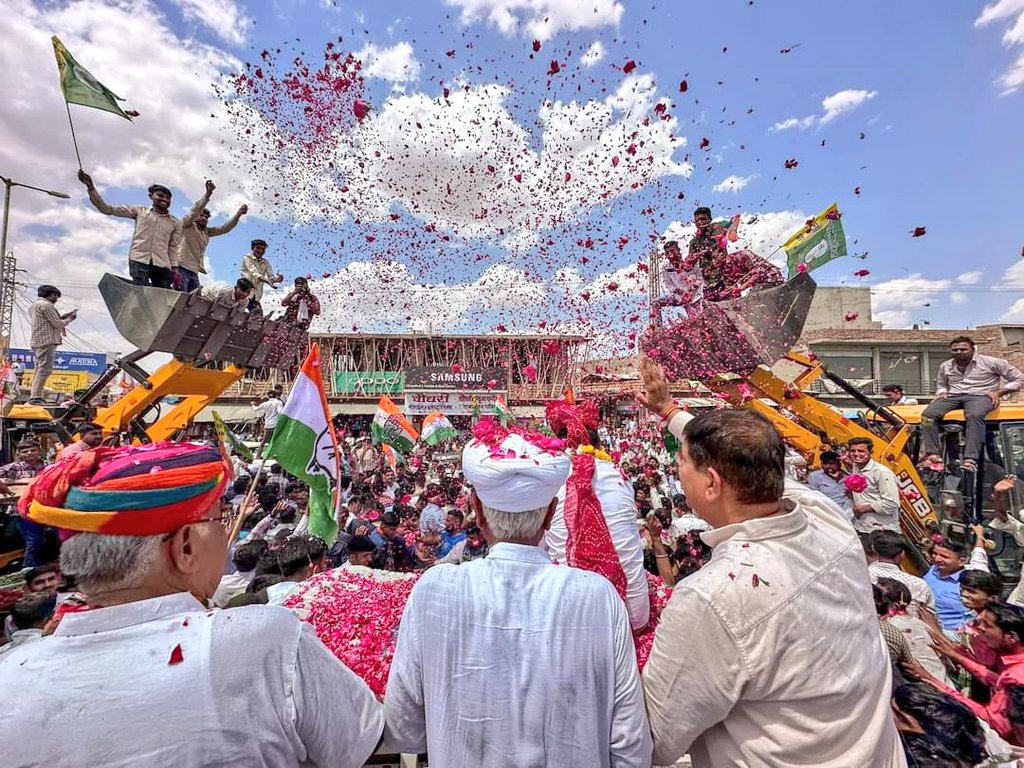 The play of flowers & desert clouds. From the election rally of Umeda Ram Beniwal, Congress' candidate for the Lok Sabha polls in Barmer. Barmer April, 2024