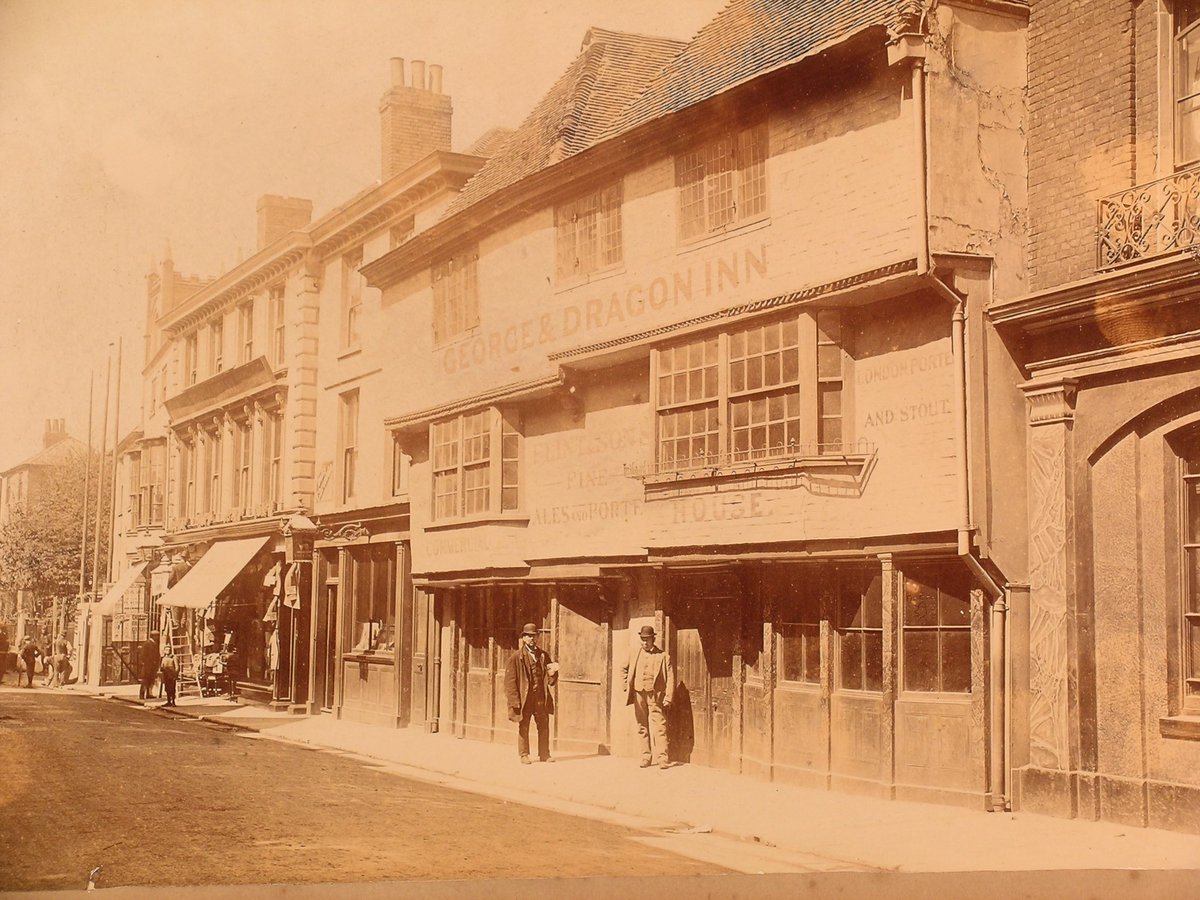 🏴󠁧󠁢󠁥󠁮󠁧󠁿 #DidYouKnow? Before The Beaney was here on #Canterbury High Street there was The George & Dragon inn. Toward the very end of the 19th century the pub was demolished and although the city lost one of its pubs it gained a new museum and free library! #StGeorgesDay #OldPhotos
