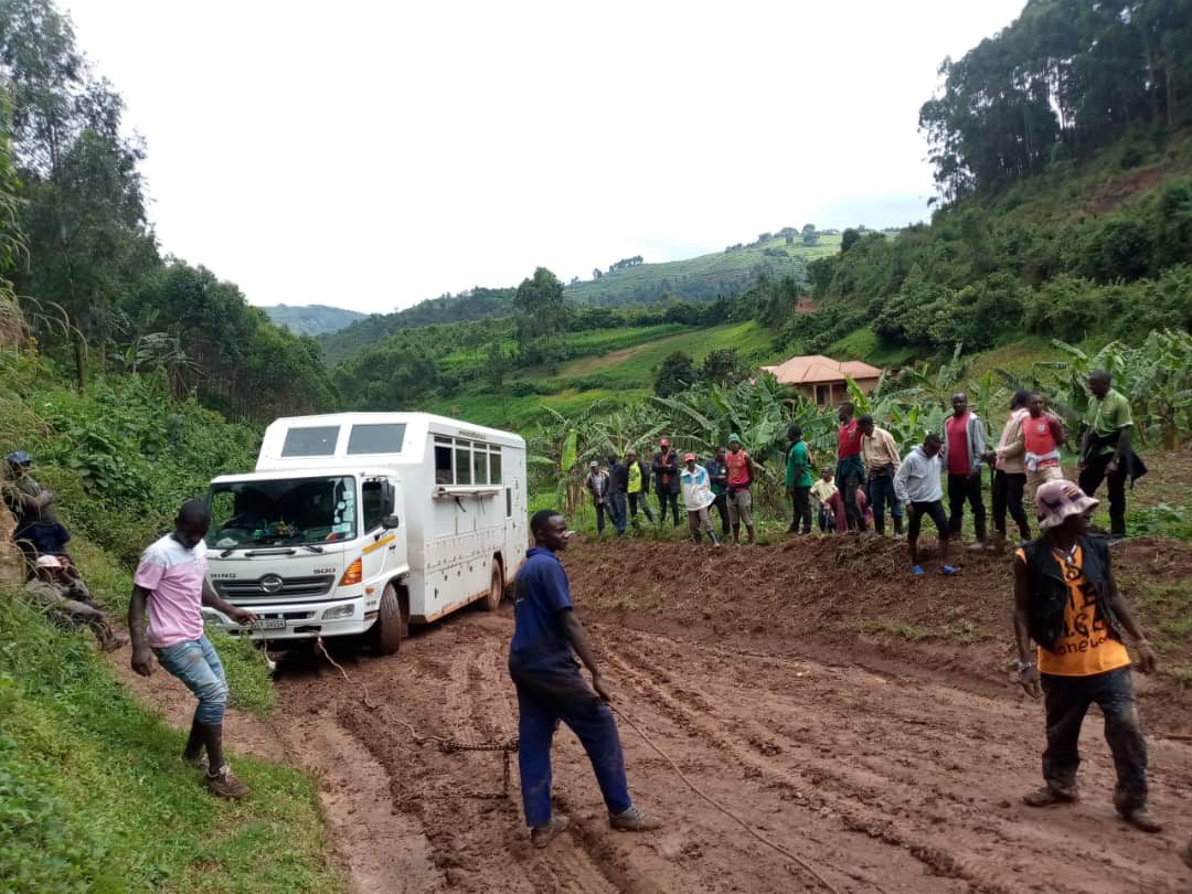 A tow truck tows a tourist van which it slid off the muddy section of Kabale -Lake Bunyonyi road in Kabale District, Western Uganda this morning. The chairman of Kigezi tourism cluster, Mr Ivan Batuma said none of the tourists sustained injuries. He attributed the incident to the…