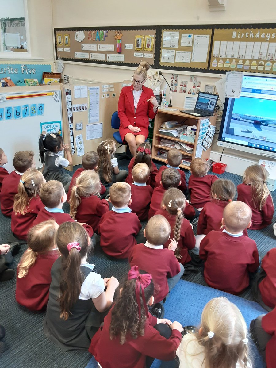 The children in reception enjoyed a visit from a real life cabin crew.