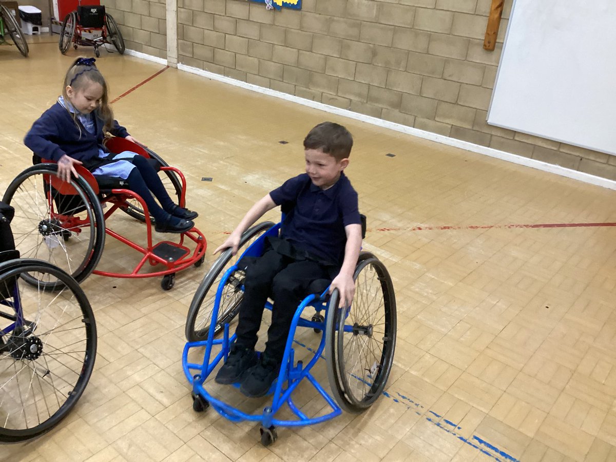 Y1JB enjoying taking part in wheel chair skills