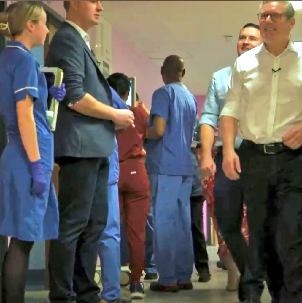 Keir Starmer and Wes Streeting inspect an NHS hospital to see how much profit their funders will make on it when they outsource it to them