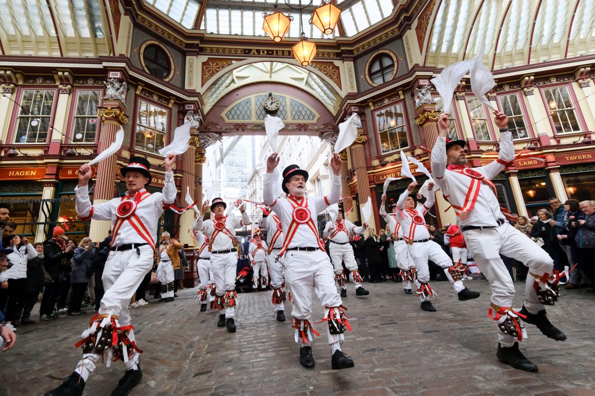 Ewell St Mary’s Morris Men perform on St George's Day at Leadenhall Market, London. Image ID: 2X2NFCF / Matthew Chattle / Alamy Live News Explore more here: bit.ly/3po8fJM #StGeorgesDay #LeadenhallMarket
