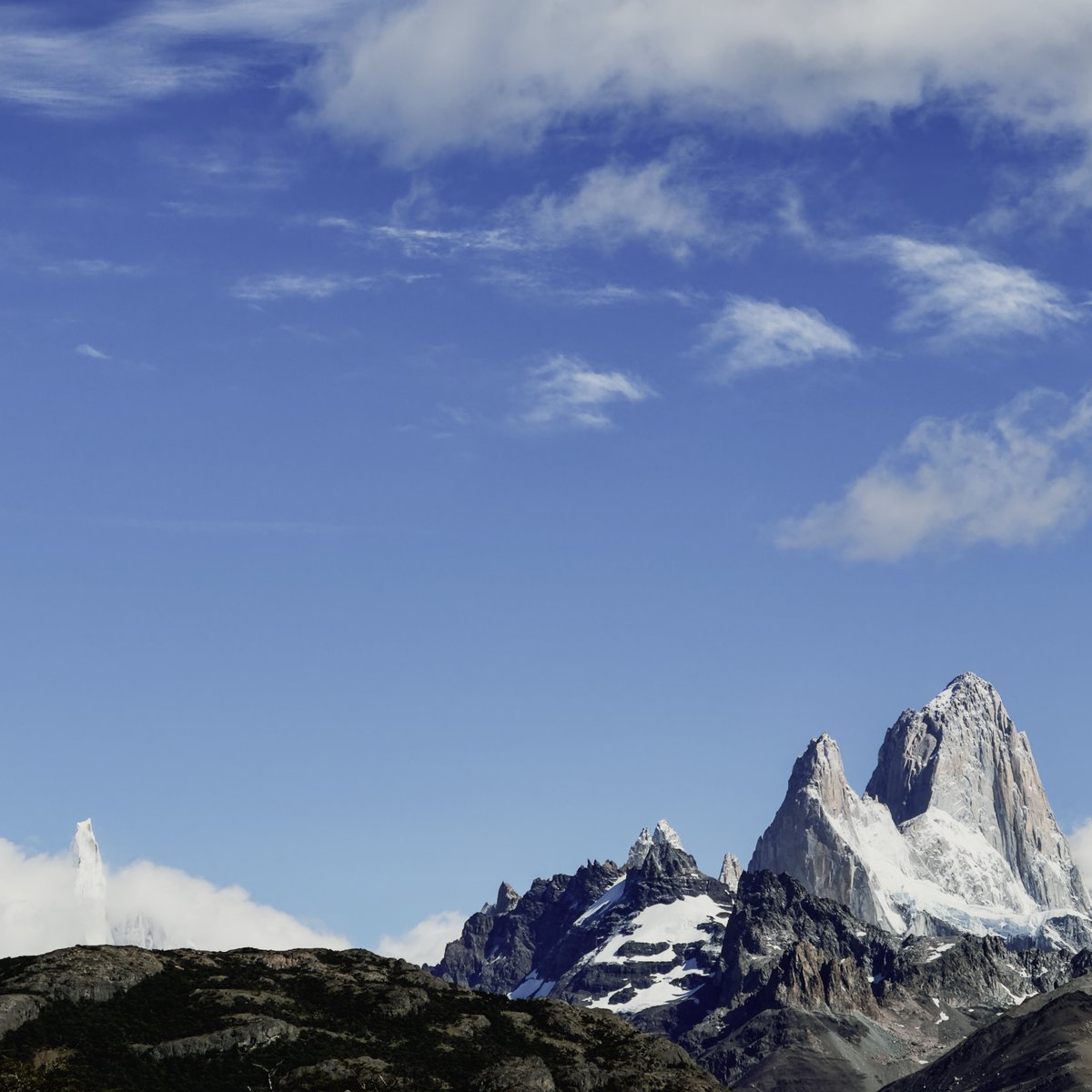 Fitz Roy and Cerro Torre rising into the heavens. 9000 ft of prominence from where I took this photo. So they look HUGE. Hear soundscapes from this amazing spot in Patagonia in my new sound library: thomasrexbeverly.com/products/patag… #fieldrecording