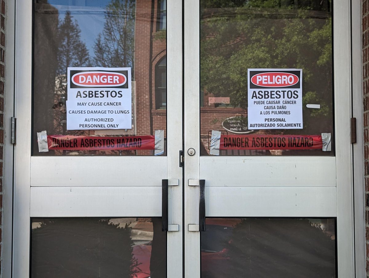 A tipster noticed that a DEMTEK dumpster appeared behind the old Herald-Journal building. Along with it, caution tape with 'DANGER ASBESTOS HAZARD' was on the front door. What's happening? What does it mean? @_Max_White_ asked. Here's what he found: bit.ly/3UemkqU