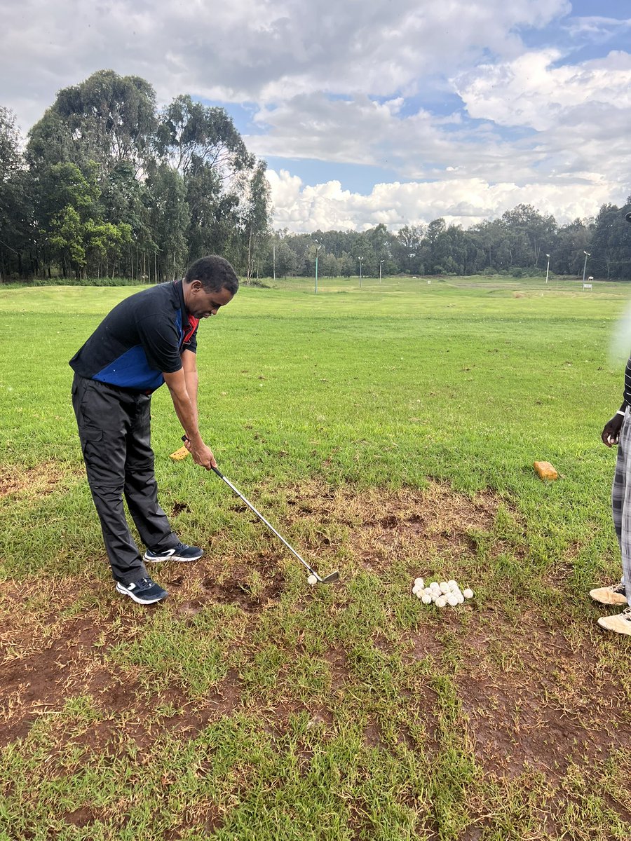 DAY ONE OF THE GAME 'kolve' learning the basic principles/concept of golfing; alignment , grip, position , posture and the swing etc .