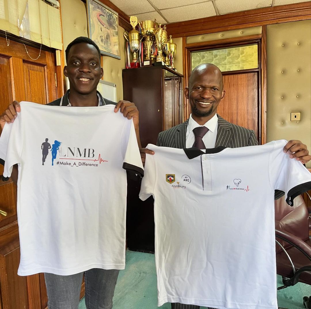 AMSUNrunning's tweet photo. Yesterday the 22nd of April 2024, our Race Director - Peter Ogutu - Presented #LNMB Polo Shirts to the Faculty Of Health Sciences Dean (UoN) Prof. George Osanjo https://t.co/U8fAYY9Tfj