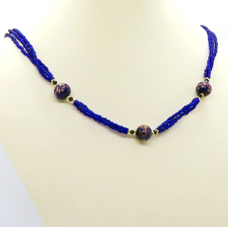 Discover the beauty of Venetian Glass with this Brilliant Indigo Cobalt Blue Necklace from RivendellRocksSedona. Stand out with this statement piece! 💙✨ #VenetianGlass #StatementJewelry #bmecountdown buff.ly/3N6PEg1