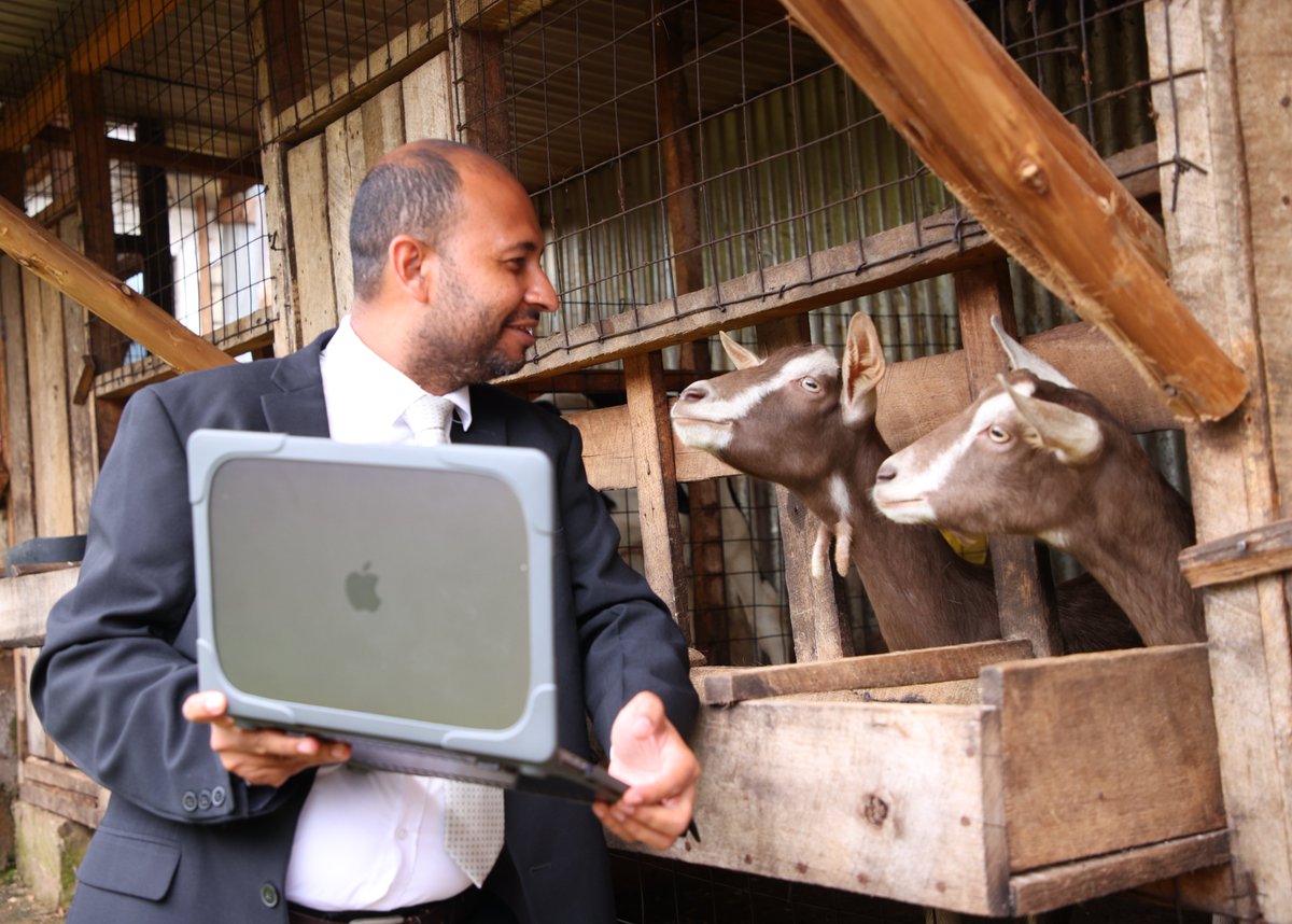 Chillin with my goat squad, discussing the future of justice! 🐐💻 Virtual courts are the real deal – my village pals say they're a total game changer #VirtualCourts