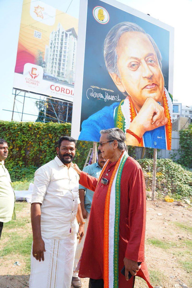 On my way to the paryadanam this morning, stopped in front of this remarkable oil painting portrait located at the Model School Junction in Thycaud. Thanked Biju, the talented artist behind this installation, for his generous tribute and capture.