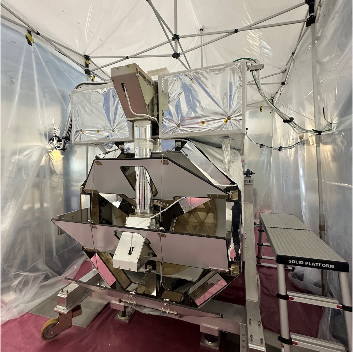 Sunrise_III's tweet photo. Making progress! While members of the #Sunrise_III team from @MPSGoettingen are preparing the telescope under the clean tent for the next flight, the gondola is also beginning to take shape. https://t.co/rXzHZ2tdKI