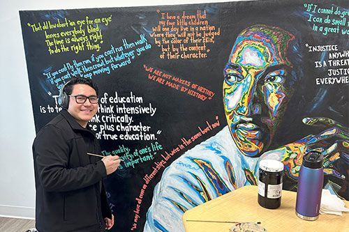 Enrique is a #FirstLiteracyScholar & student at @BHCCBoston. Recently he finished a mural that is on display at the entrance of @CharitiesBoston. Enrique is a talented artist & we are proud to support him in his journey to achieve his dreams! #adultedu buff.ly/449UiBi