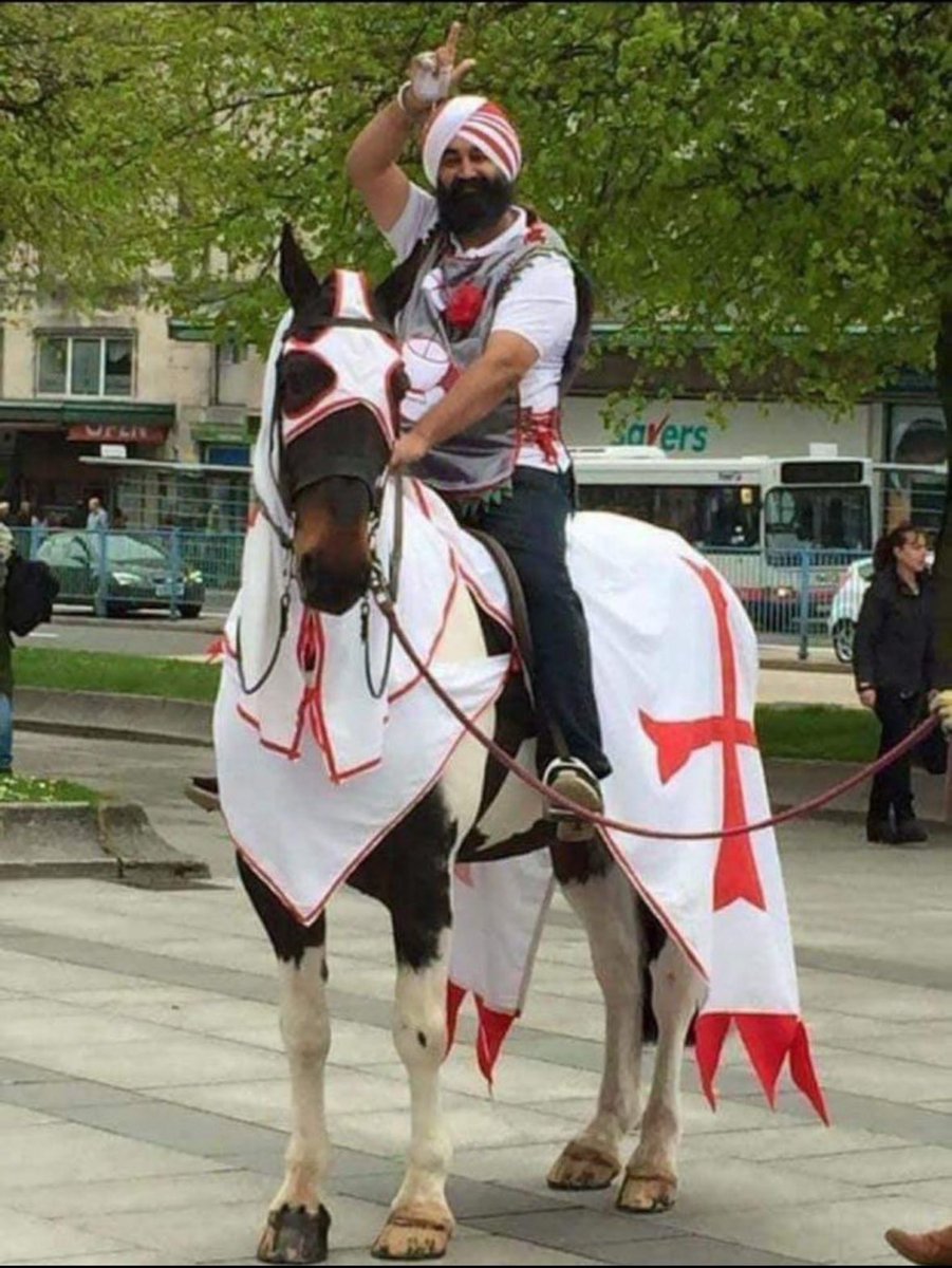 OliLondonTV's tweet photo. Patriotic English Sikh man shows off his pride for England draping his horse in the St Georges Flag while celebrating St George’s Day. 🏴󠁧󠁢󠁥󠁮󠁧󠁿 

April 23rd is the feast day of Saint George, celebrated by Christian churches and countries where he is the Patron Saint.

📸 @PlymouthChaz https://t.co/JVGd6VRLmS