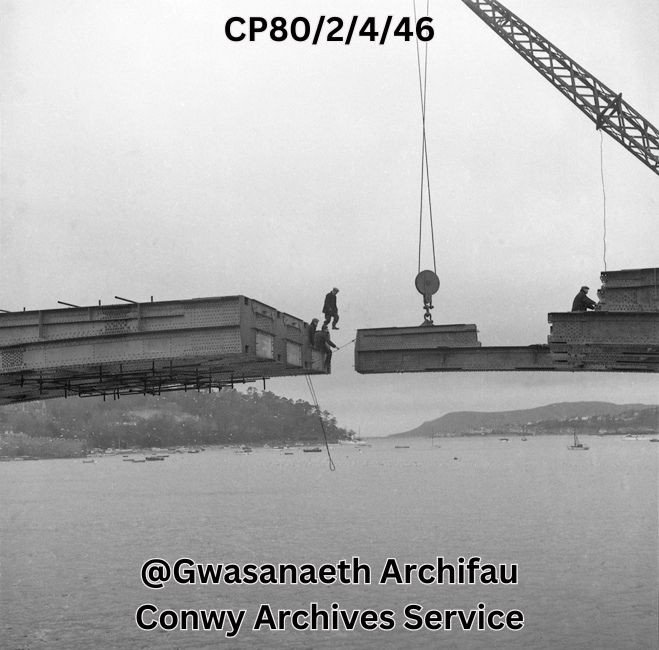 In the mood to do #SomethingScary ? Perhaps not as scary as this man from 1958, in the act of the first crossing of Conwy's Road Bridge. He might have been a bit too eager. #Archive30