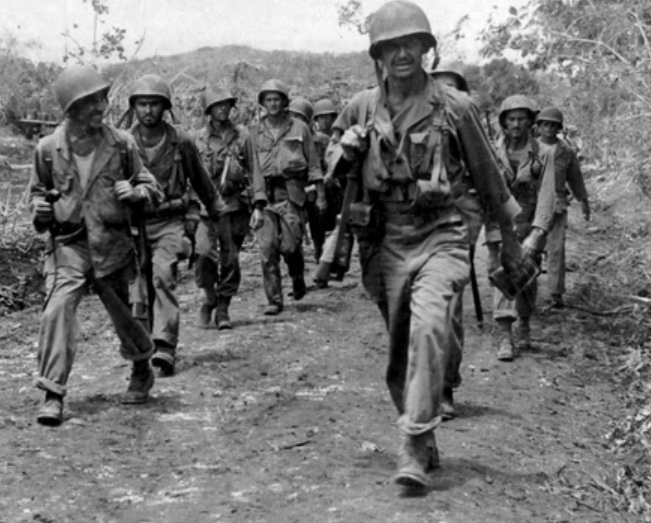 In June of 1944, soldiers of the 27th Infantry Division move inland to meet the enemy, after landing on Saipan. 🪖