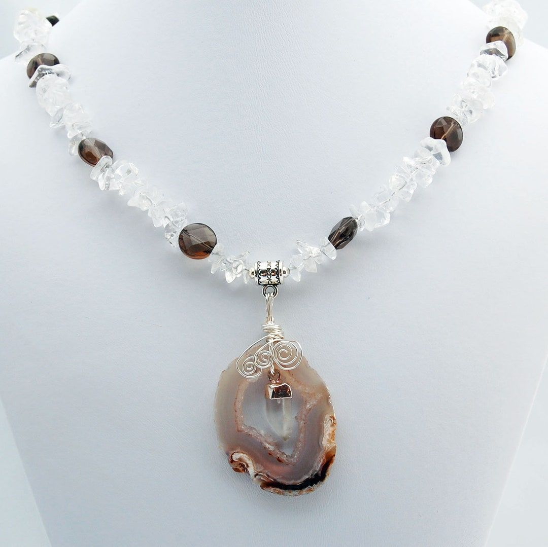Agate Druzy Crystal Point Smoky Quartz Pendant Necklace from RivendellRocksSedona - a stunning piece that exudes natural beauty and positive energy. Elevate your style with this unique accessory. #CrystalJewelry #RivendellRocksSedona buff.ly/46pYe0e