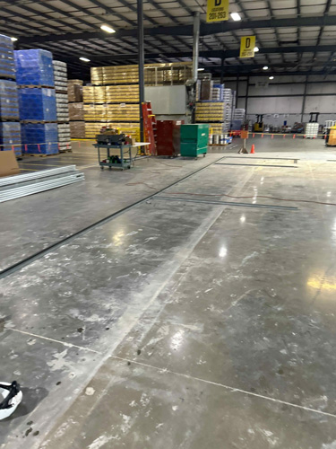 Work is ongoing at Standard Beverage Corporation. We are renovating receiving offices which involves a complete scrape and rebuild of the space. Demo is complete, underslab plumbing is installed, new concrete placed and finished, and framing is starting. Lots more to come!