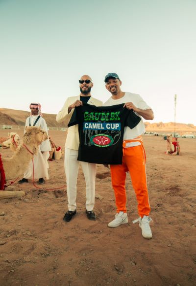 arabnews's tweet photo. -@THEREALSWIZZZ (Swizz Beatz), the owner of the @SaudiBronx camel racing team, is excited about his prospects at the #AlUlaCamelCup @RCU_SA @SCRFSA_EN https://t.co/RMDlgquFPF https://t.co/3i7FxSvl3p