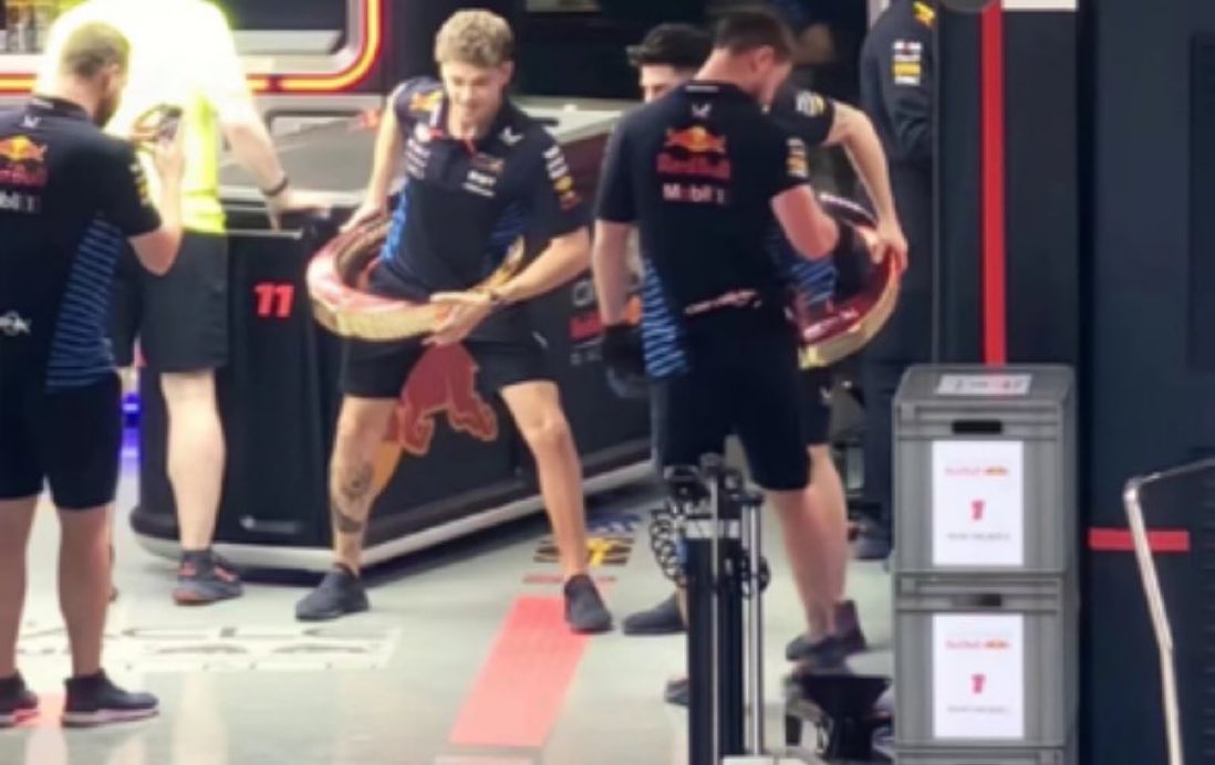 The Redbull crew doing the hula-hoop celebration with the Chinese gp trophy.

the mechanics did the iconic shit lessgooo ✨