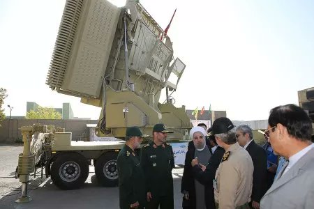 ASIFSAE73075455's tweet photo. ⚡Breaking News🚨🚨🚨
#Iran Unveils New Weapon Capable of Taking Out #America's #StealthJets
A #Bavar373 #airdefensesystem is seen in the background as #Iranian officials talk to one another in Tehran, on August 21, 2016. Iran showcased a new iteration of the Bavar-373 in a #Military parade