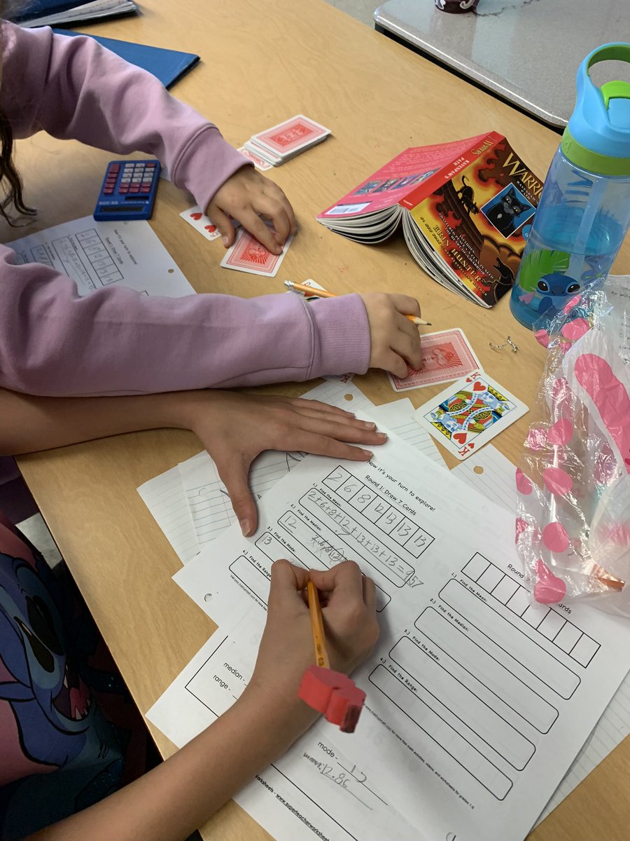 Practicing calculating mean, median, mode, and range with playing cards! 🃏