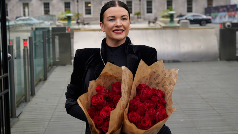 Lisa Lawlor pictured with 49 roses, one for each victim of the Stardust fire as Taoiseach Simon Harris apologises on behalf of the Irish state to the 48 families of the Stardust victims Read more: irishnews.com/news/ireland/t…