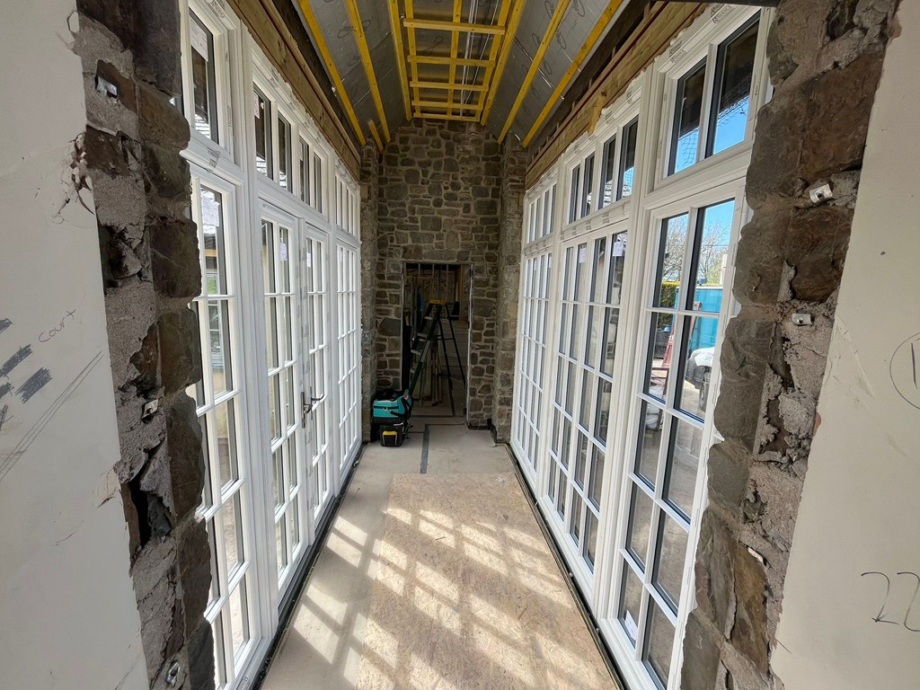 ✨ Take a glimpse at the stunning transformation installed by our skilled Barnstaple team! They've expertly joined two buildings with bespoke French doors and surrounds, creating a seamless and luminous passage. 🏠☀️ camelglass.co.uk