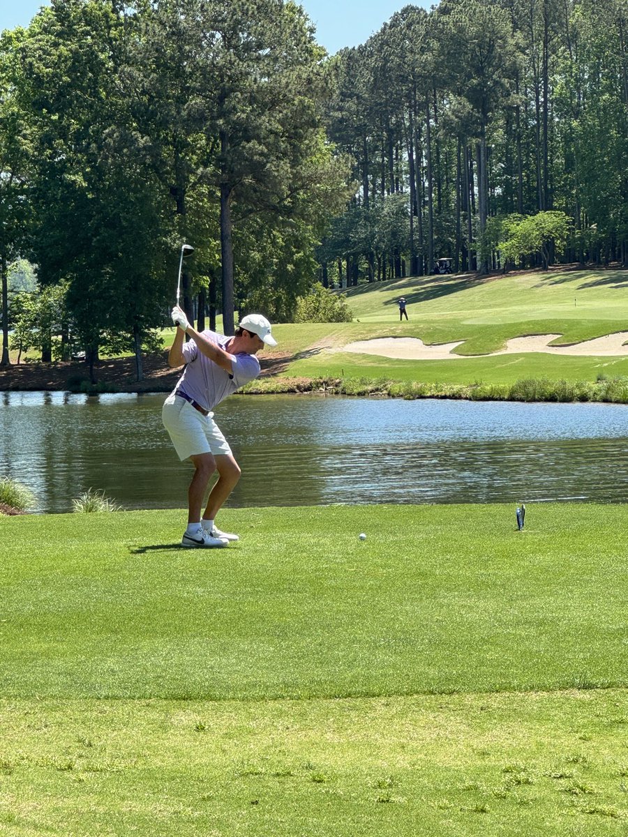 Will Morlan and Trey Diehl tee off over the water on No. 18.