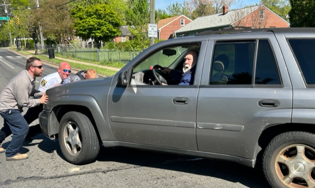 On the way to pick up Meals on Wheels, here's what happened. Interim Chief Pedroso and Officer Ignacio saw a stalled vehicle and stepped out to push it out of the roadway on Duke! Thanks to a resident who pitched in! #BetterTogether #Community