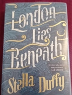 ReadEasySotonIW's tweet photo. Publicity Organiser Linda is loving London Lies Beneath by Stella Duffy.  “Set in the slums of south London in 1912, following the hopes &amp; dreams of 3 boys obsessed with becoming scouts &amp; sailing down the Thames. There is a rich cast of characters to enjoy &amp; I'm captivated!" 📚😃 https://t.co/ya7YX1L7A2