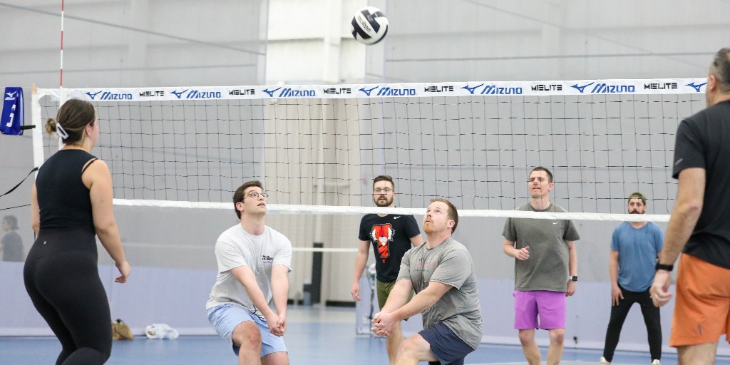 Bump, Set, Spike 🏐 Our indoor volleyball tournament is a favorite among team members.