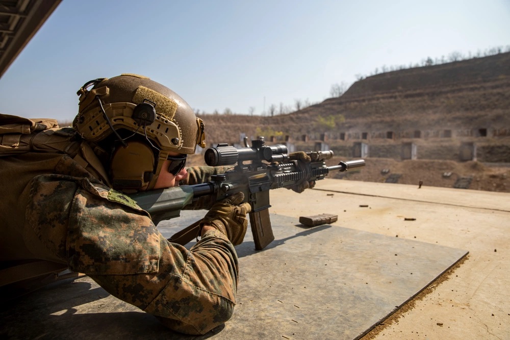 Marine with the 13th MEU takes aim with his M27 during a joint exercise with the ROK, South Korea, 2023.