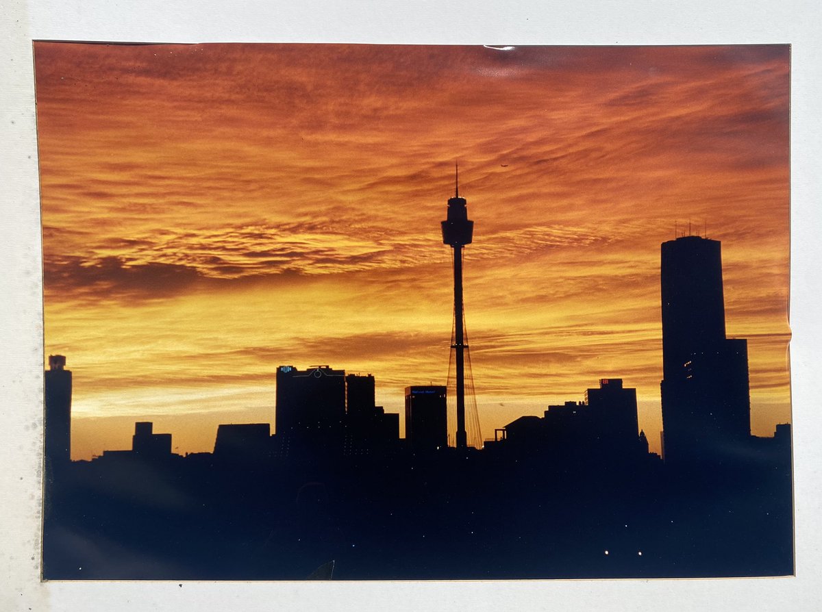 I took this shot 28 years ago in the centre of #Sydney #Oz 
We ran to the top of the backpackers hostel cos the sky was glowing. 
I mean the WHOLE sky was this colour - it was absolutely nuts !!