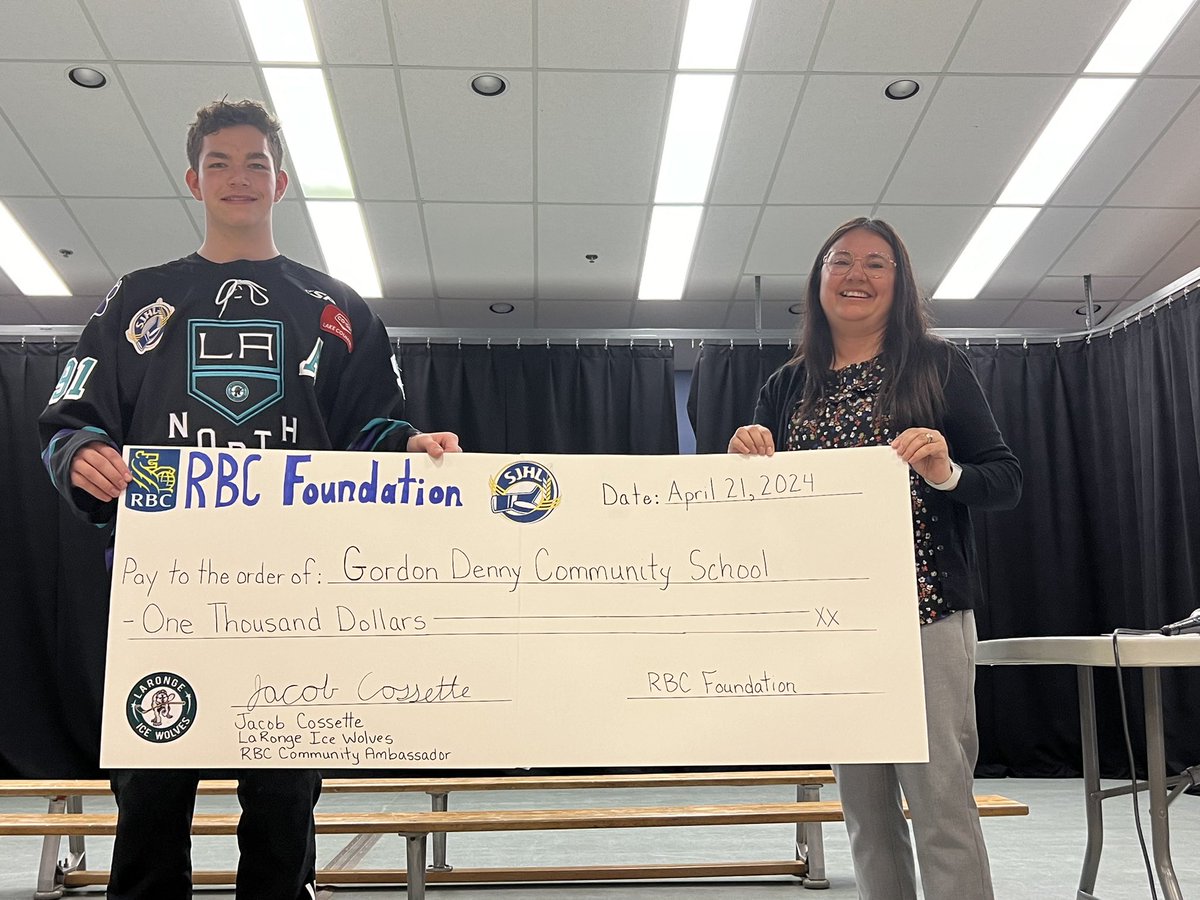 SJHL_IceWolves's tweet photo. Jacob Cossette dropped off a cheque for $1,000 at Gordon Denny Community School this week. This donation was made possible by the RBC Community Ambassador Program. #SJHL https://t.co/GWaPPNMKdb