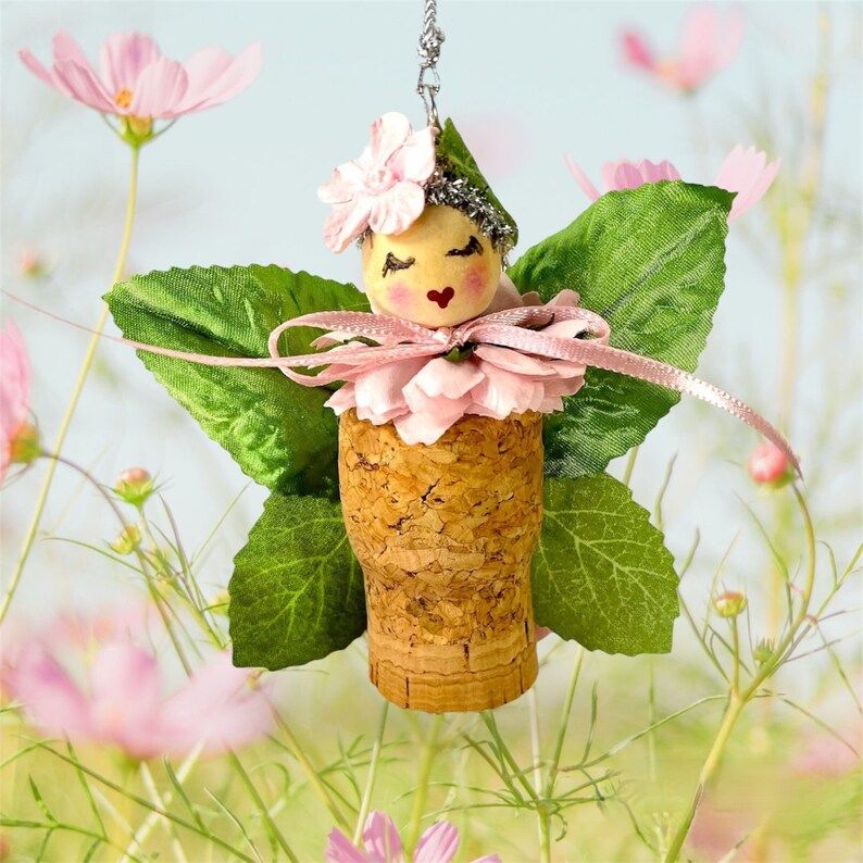 Add a touch of whimsy to your spring decor with these charming fairy ornaments! Handcrafted from recycled wine corks -> buff.ly/4aHWhPM ♻️🌸🌿 #fairies #springgifts #etsystore