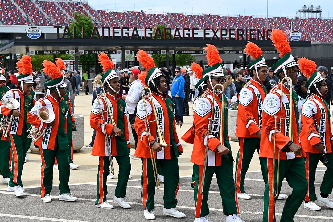 BhamCitySchools's tweet photo. This is how we do #DEGA. The @HHSViks Marching band represented #BCS Sunday at @NASCAR'S #GEICO500. The scholar musicians and auxiliary teams turned up the music and the fancy moves as fans entered the track. Shout out to everyone who made it happen for our students. https://t.co/hsCQxQXM2d