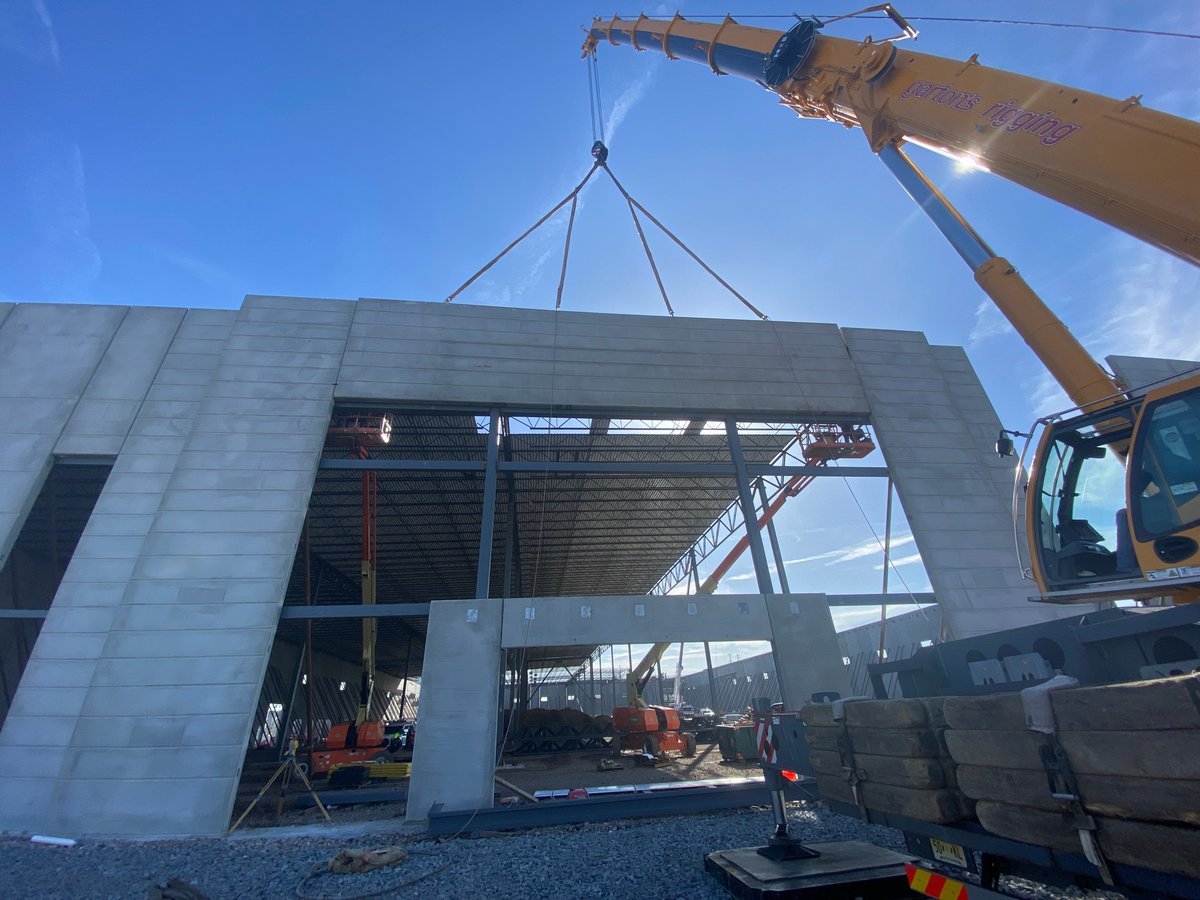 Gartonsrigging's tweet photo. Setting the foundation for greatness in Newark, NJ! 🏗️ Our crew expertly positioned precast walls weighing 76,000 pounds each. Garton's Rigging is all about turning heavy challenges into monumental achievements. #HeavyLifting #GartonsRigging #NewarkNJ https://t.co/V8ioqwnGEc