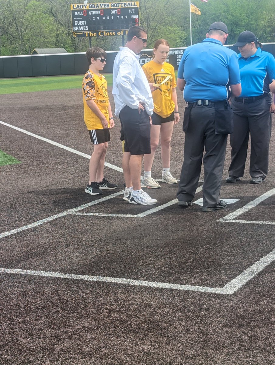 BravesAthletics's tweet photo. .@OttawaBravesSB @jaykahnt and his three kids at home plate for the final home double header of his coaching career. It's been a heck of a ride!! Congratulations Coach Kahnt. #BraveNation https://t.co/9zIr3dMdYU