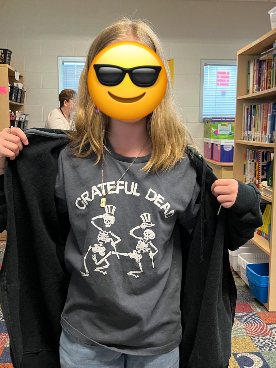 DAISLibrary's tweet image. Mrs. Farrell was very impressed with this student’s t-shirt today! 😃✌🏻🎸