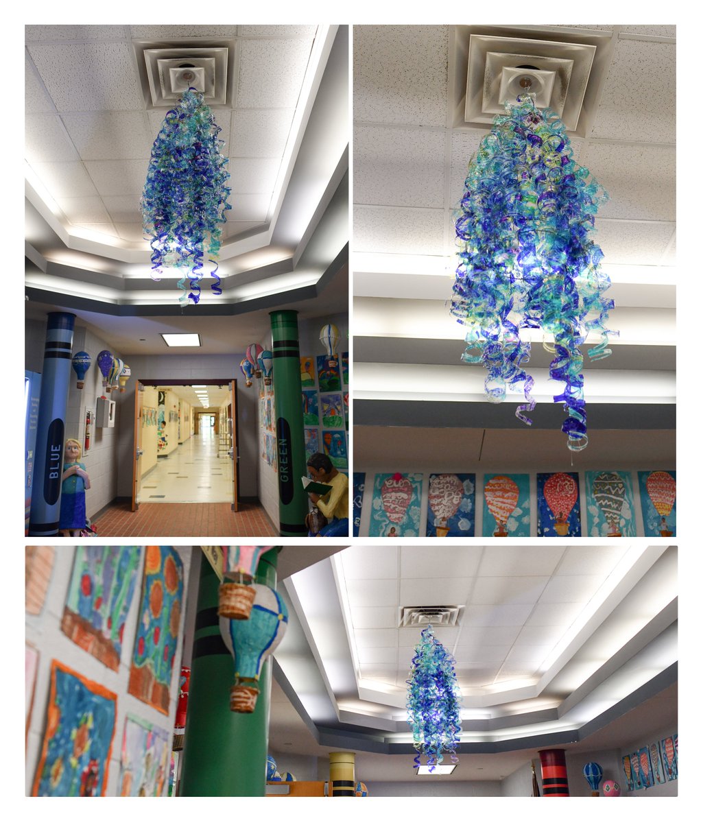 #Chihuly or @ccesdukes inspired Chihuly? This beautiful Chihuly inspired chandelier was created using over 100 recycled plastic bottles colored with blue and yellow permanent markers. Such a beautiful entrance to our school.💙💛 @cucps #recycledart #collaboration #WeAreCuCPS